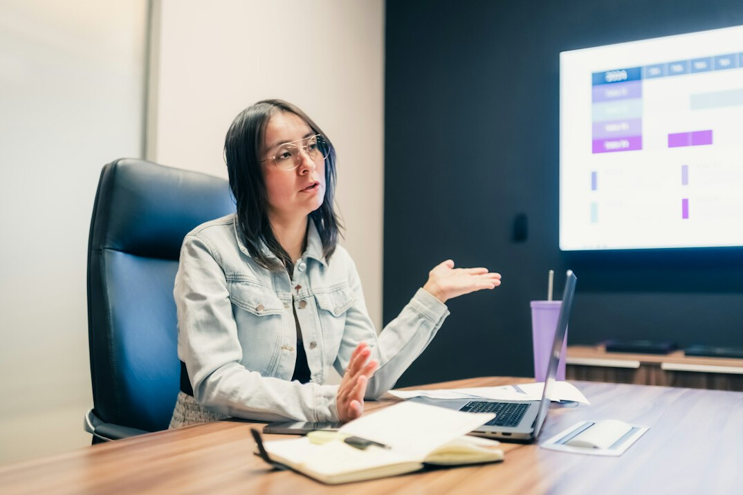 woman presenting in office